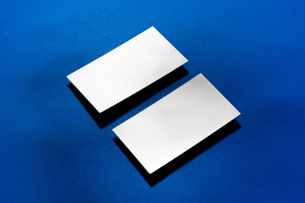 Two stacks of blank businesscards