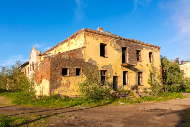 A two-storey abandoned house on a deserted street in an abandoned settlement Severny, Vorkuta. Russia