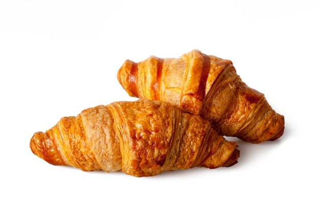 Two sweet croissant in white background