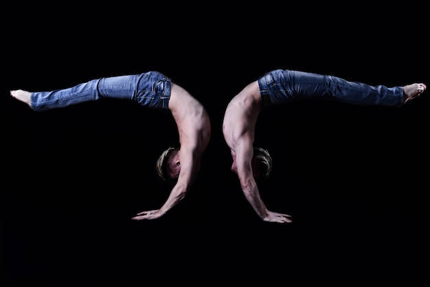 Two twin brothers perform acrobatic elements