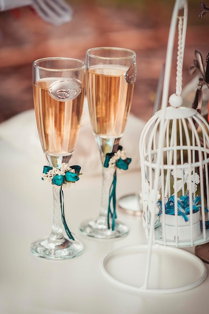 Two wedding glasses with champagne