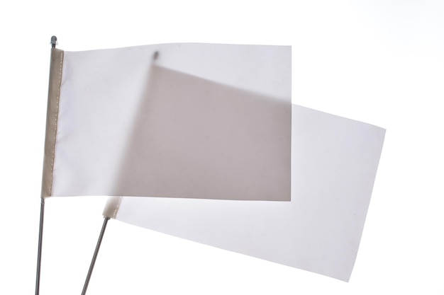 Two white flags on a white background in display