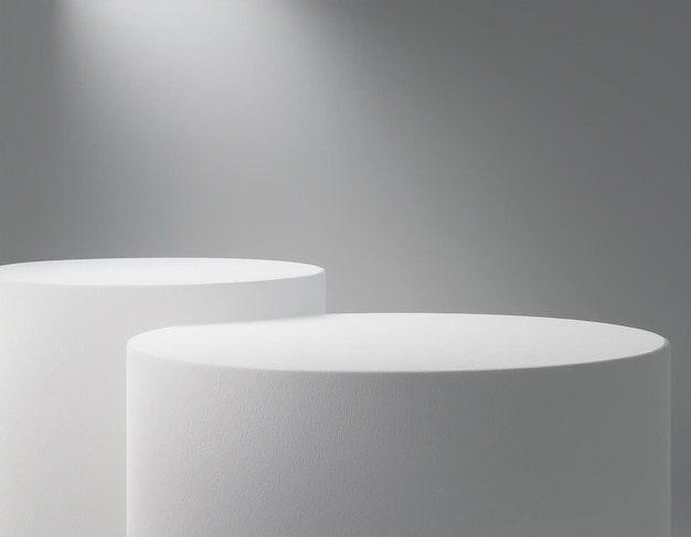 two white round tables with one that has a white one on the top