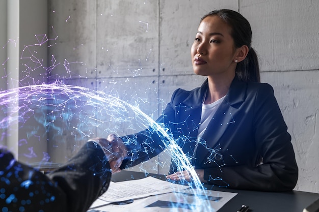 Two woman handshake Abstract tech hologram Multiexposure International business