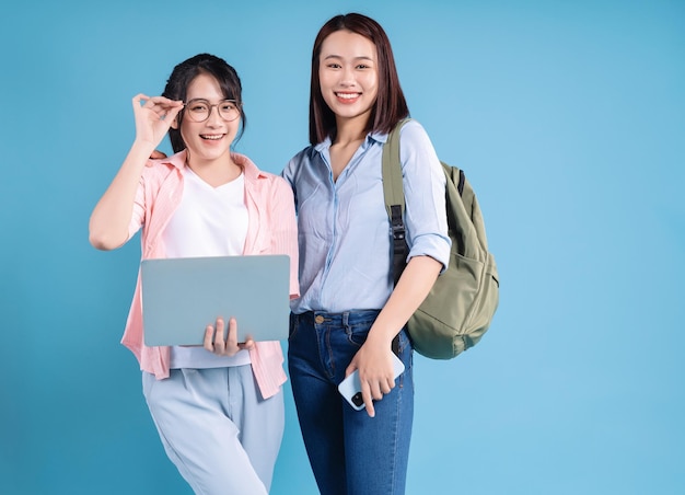 Two women on blue background