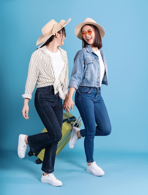 Two women on blue background