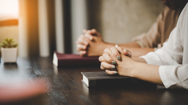 Two women praying worship believe