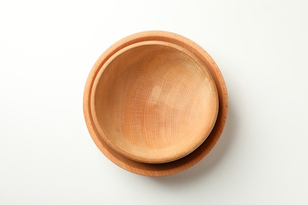 Two wooden bowls on white