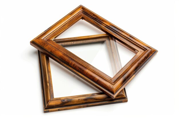 Photo two wooden picture frames against white background