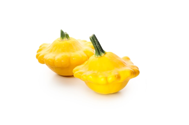 Two yellow pattypans isolated on white background