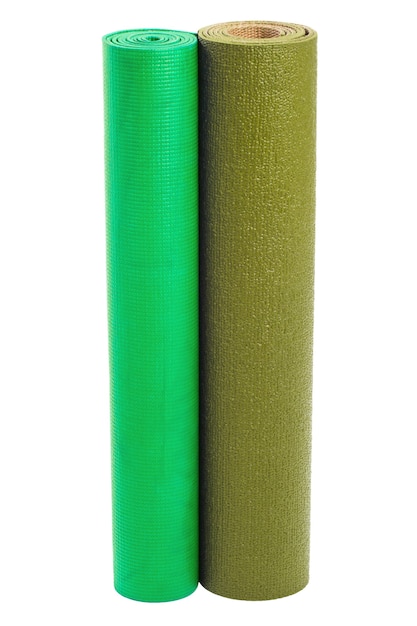 Two yoga mats isolated on a white background. Green gymnastic mats.