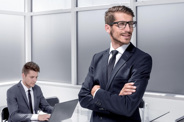 Two young business men isolated on office