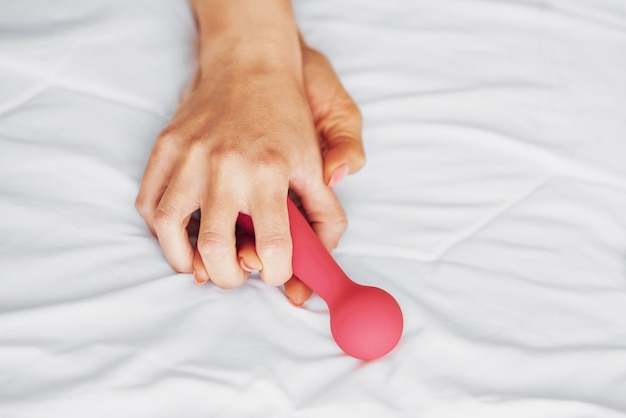 Two young girlfriends on the bed. High quality photo