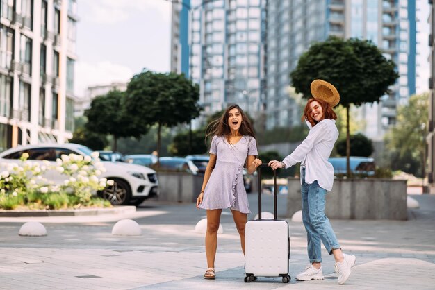 Two young women on the city street