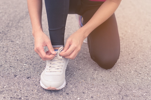 tying a shoelace