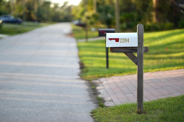 Typical american outdoors mail box on suburban street side