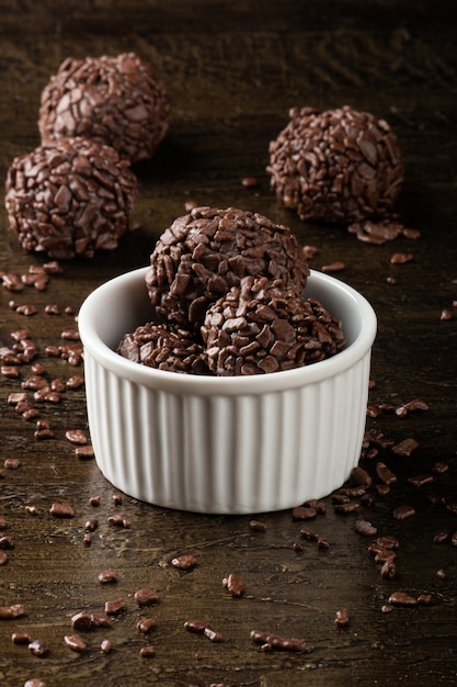 Typical brazilian brigadeiros in white bowl