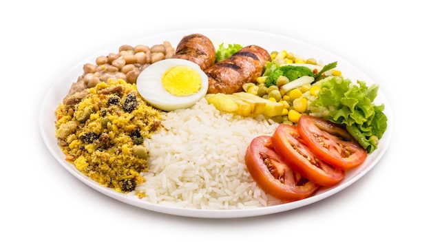 Typical brazilian meal rice and beans tomato salad boiled egg and french fries called a traditional dish or executive dish