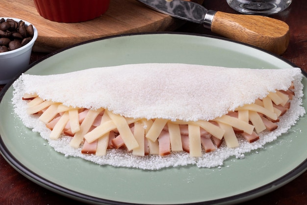 Typical Brazilian tapioca stuffed with turkey breast and cheese.