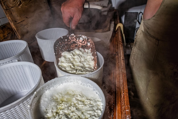 Typical copper perforated shed with fresh genuine cottage cheese