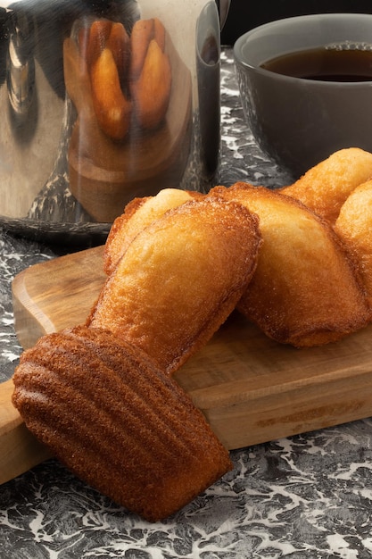 Typical French dessert madeleine with coffee