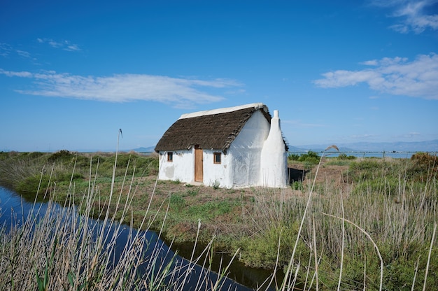 Typical hut of cultivated rice lands of the Ebro Delta, Spain