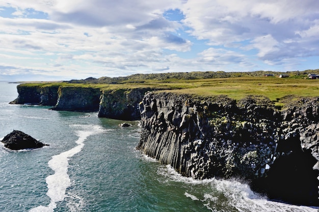 Typical Icelandic sunrise sunset cliff landscape at Arnarstapi area (Gattkletur) in Snaefellsnes peninsula in Iceland.