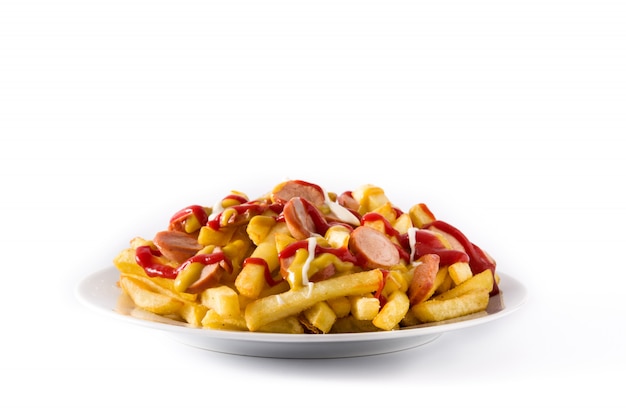 Typical Latin America Salchipapa. Sausages with fries, ketchup, mustard and mayo, on white