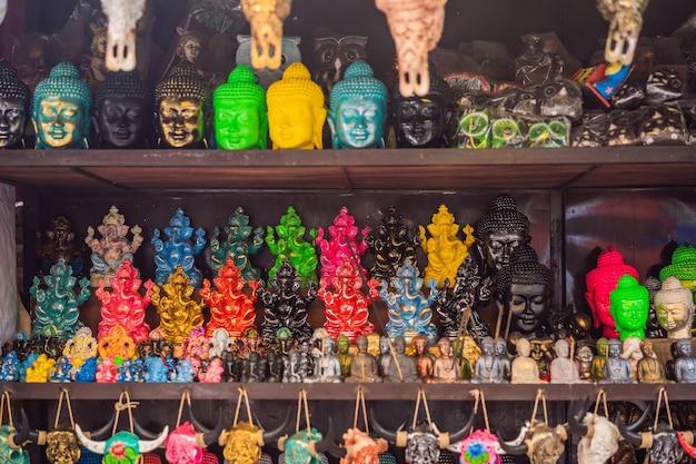 Typical souvenir shop selling souvenirs and handicrafts of Bali at the famous Ubud Market Indonesia Balinese market Souvenirs of wood and crafts of local residents