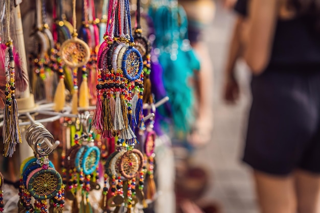 Typical souvenir shop selling souvenirs and handicrafts of bali at the famous ubud market indonesia