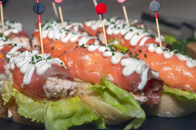 Typical spanish snack called pincho with salmon