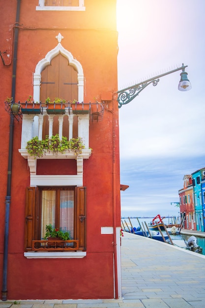 Typical tourist place burano island in venetian lagoon italy beautiful water canals and colorful