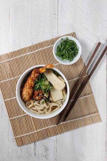 Udon udang or Japanese tempura udon noodles in a bowl