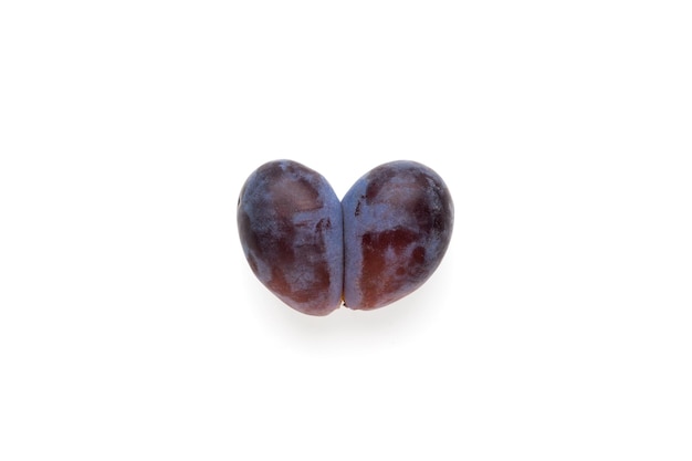 Ugly double prune or french plum in shape heart Ugly fruits Reduction organic food waste