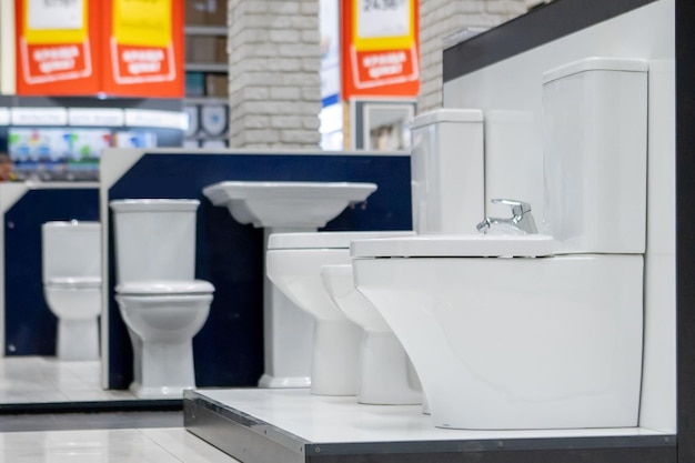 Ukraine Kyiv December 19 2019 Assortment of toilets in a plumbing store Trade in household ceramic products for the home