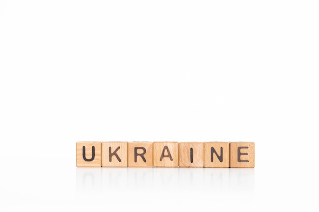 Ukraine word on wooden blocks Isolated on a white background