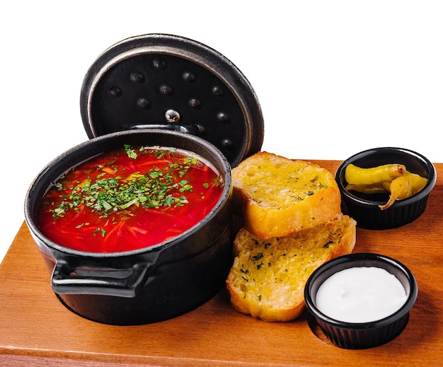 Ukrainian borscht red soup with garlic bread