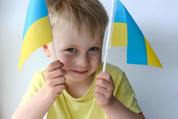 Ukrainian boy with the flag of Ukraine