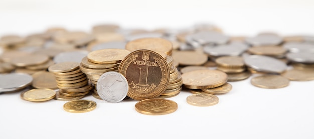 Ukrainian coins on white background