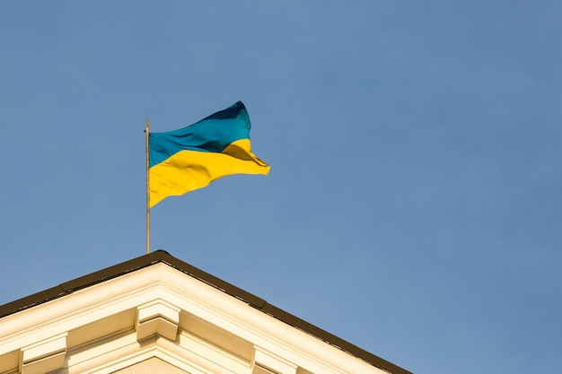 Ukrainian flag on top of a government building