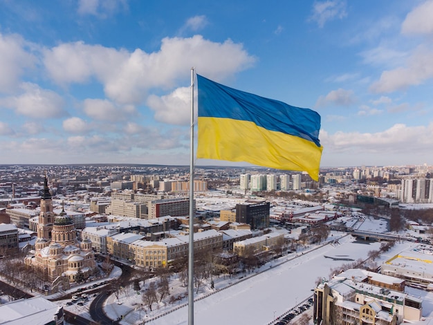 Ukrainian flag in the wind. Blue Yellow flag in the city of Kharkov.