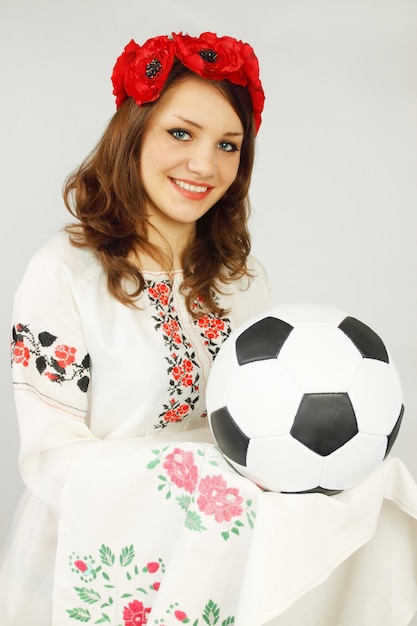 Ukrainian holds soccer ball invitation to Euro 2012