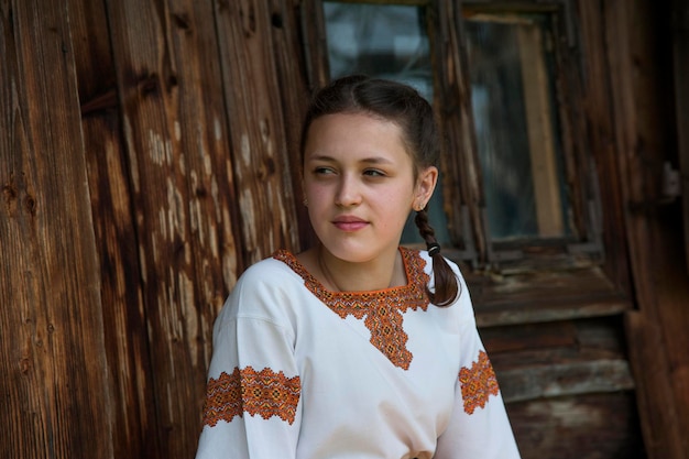 Ukrainian national clothes. A beautiful girl in an embroidered dress.