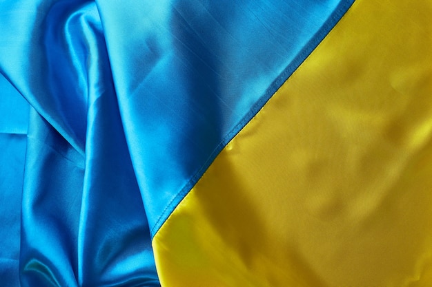 Ukrainian national flag colors on beton background Yellow and blue colors Ukraine nation independence celebration symbol