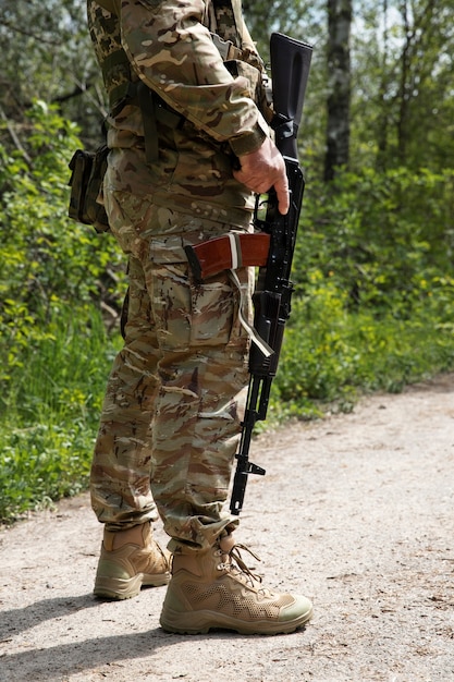 Ukrainian soldier in uniform side view