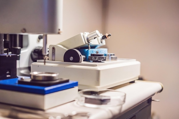 Ultrasonic Cutter System and precision micrometer grinder polishing machine used to prepare samples for electronic microscopy investigation