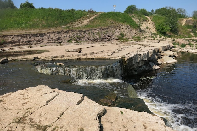 Ulyanka Russia June 16 2023 Waterfall on the Tosna River