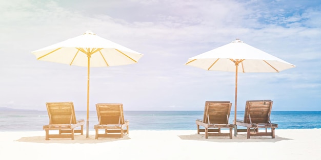 Umbrella and chair around beach sea ocean on blue sky