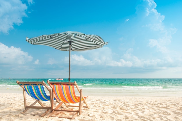 Umbrella and Chair beach for relaxation at the beautiful white sandy beach