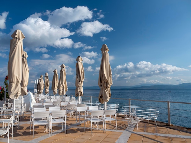 Umbrellas in a Greek tavern without visitors in Greece